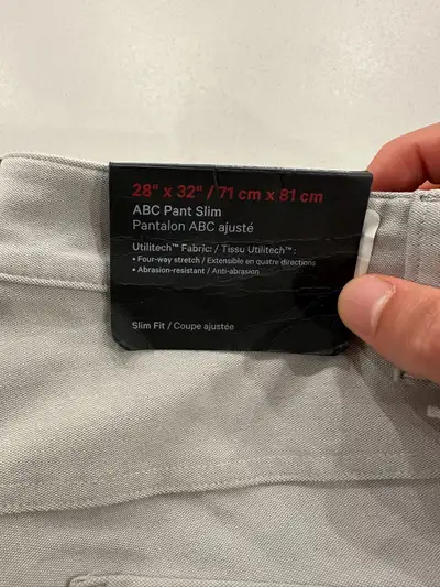 - Brand new with tag, never worn - 28” waist / 32” length, slim fit - Grey colour - Utilitech fabric