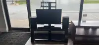 Tv stand, tv and speakers 