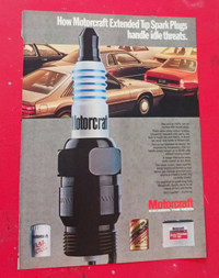 1985 MOTORCRAFT SPARK PLUGS AD WITH MUSTANG TEMPO THUNDERBIRD
