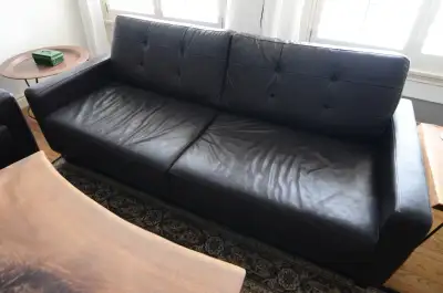 Beautiful mid-century modern inspired high quality genuine leather Loveseat and sofa very comfortabl...