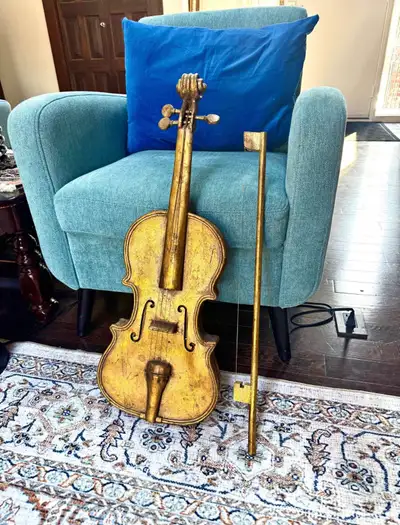 The violin is a very nice decoration for inside or outside the body of the instrument is made of cem...