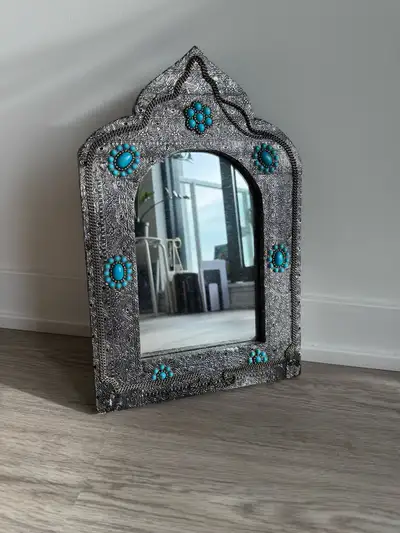 11x16 inches (28x40 cm) Ornate silver-colored metal mirror, arched frame, turquoise-colored stone em...