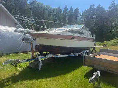 24’ Doral cabin, trailer and all stands. Boat was purchased as a project but too many other things b...