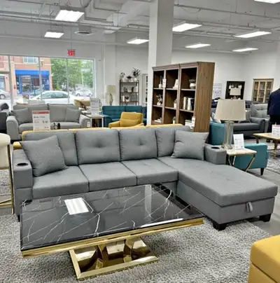This stylish, sectional sofa features a versatile grey finish and comfortable seating, perfect for a...