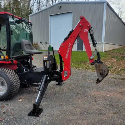 Mahindra 26B Backhoe Works like new, just purchased a mini excavator. Currently on a Mahindra eMax 2...