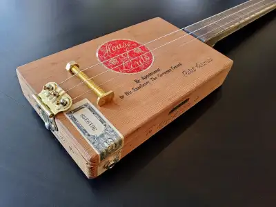 Built right here on Vancouver Island. Each 3 string Cigar Box Guitar is handmade one at a time with...