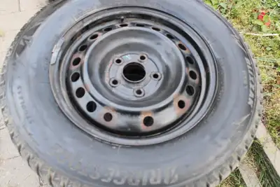 4 winter tires bridgestone 235x65r16 with honda rims tires has more then 95% tread left call only 58...