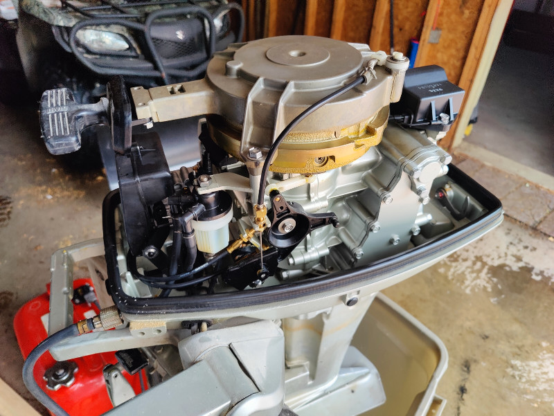 10hp Suzuki 2 stroke outboard motor, aluminum boat + trailer