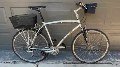 Very smooth running and shifting bike. New: tires, seat, pedals, grips, bottle cage, rear rack & bas...