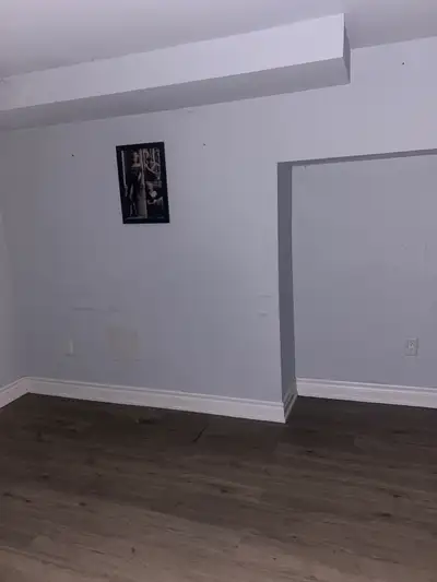 Large bedroom in shared basement .