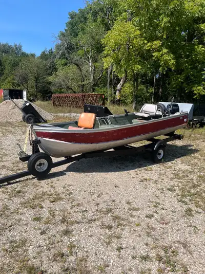 14 foot tinner with a 2019 ish mercury 9.9 four stroke! Motor has less than 50 hours on it ! Comes w...