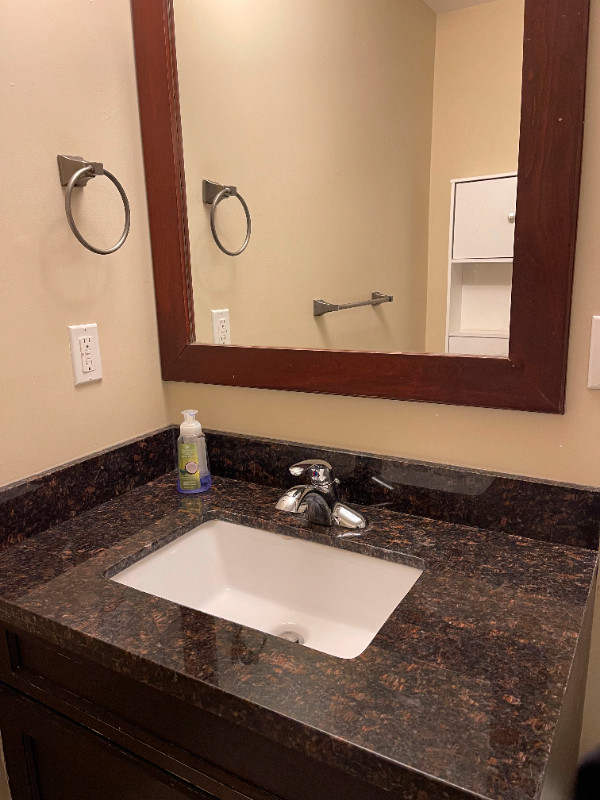 Two bedrooms basement suite in eagle ridge for rent 1400 Long Term