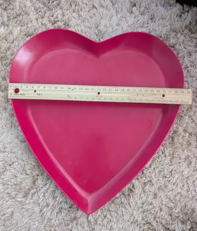 Heart shaped plastic trays., View more