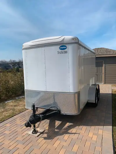 UNITED TRAILER; GVWR 7000 lbs, GAWR 3500lbs/axle Interior Mounted spare wheel,12v Dome Light/wall sw...