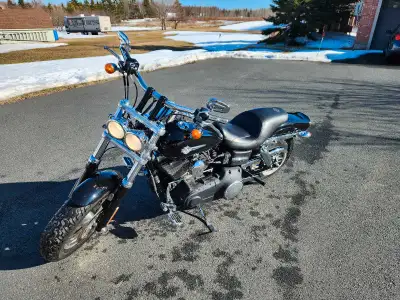 Excellent condition, twin cam 103 engine. Comes with quick release windshield and passenger back res...