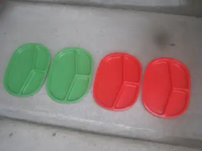 Four plastic divided plates, View more