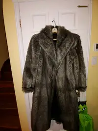 Simulated fur coat. Womans