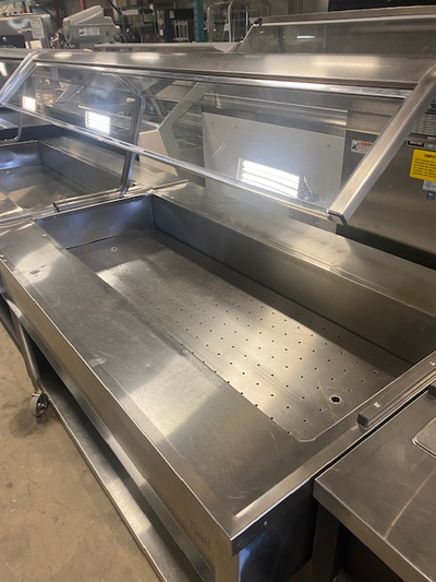 You are viewing a used restaurant cold food buffet table. This Quest 59" wide model has 4 castor whe...