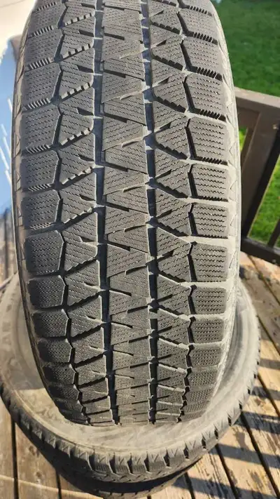 Asking $450 obo. 235/65/R17 on Steel rims, Bridgestone tires, used. Perfect for safe winter driving....