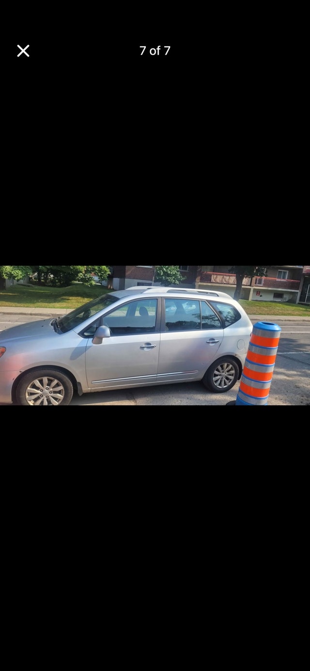 Kia Rondo 2011 — photo 3
