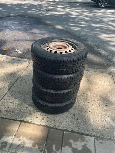 Used for only 3 months Winter Tires 185/65R15 Bridgestone Blizzak With rims Excellent condition Used...