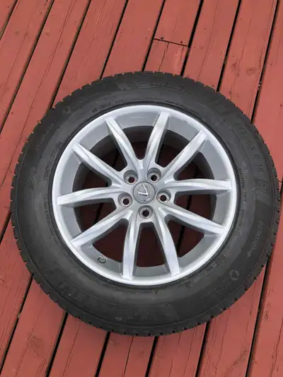 Putting for sale four 235/65R18 Michelin X-ice Snow SUV winter tires on LEXUS Original alloy rims 5x...