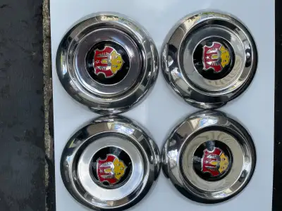 4 caps de roues en excellente condition pour Oldsmobile de 1949 à 1953