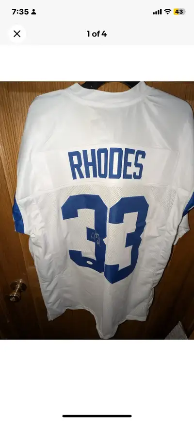 , signed Indianapolis Colts jersey Dominic Rhodes, featuring his autograph. The autograph authentica...