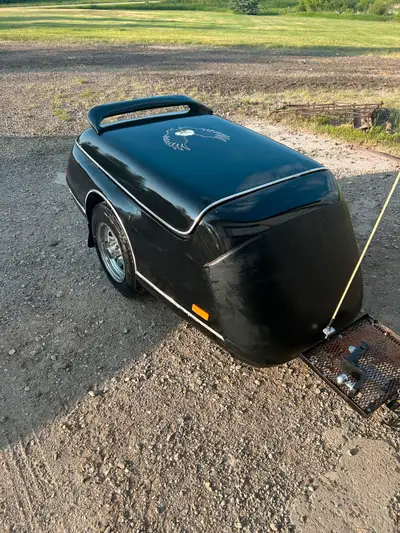 Escapade motorcycle trailer. Nice shape, carpet inside, front rock guard, swivel hitch, spoiler, tar...