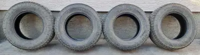 Set of 4 Nitto A/T Terra Grappler G2 LT265/70R17 121/118 S Load Range E Approx. 40% tread left