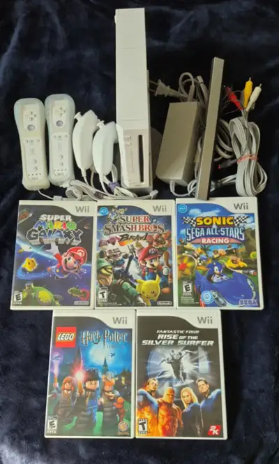 Nintendo Wii W/ 2 Controls: Mario Galaxy, Super Smash Bros Brawl, View more