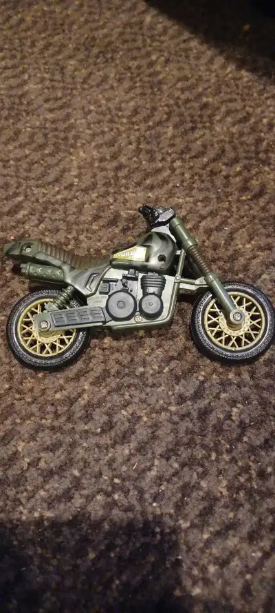 I'm offering a Soldier Force motorcycle toy, perfect for collectors or kids who love action figures....