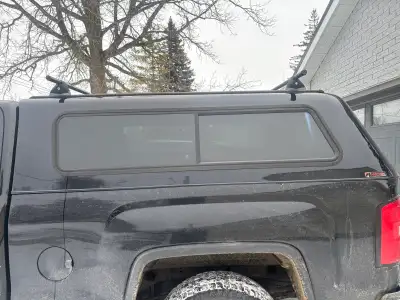 Black truck up on standard bed. In prefect working order. OBO