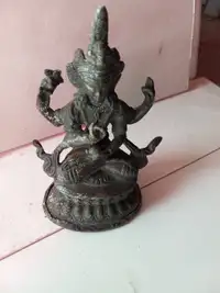 antique small buddha statue