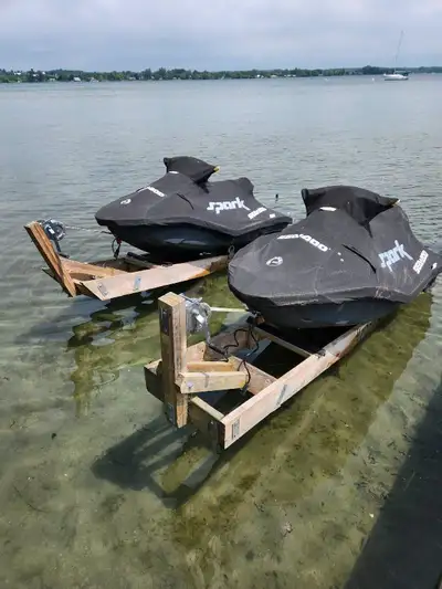 Get ready for summer fun with these two Sea-Doo Sparks and a trailer, perfect for hitting the water...