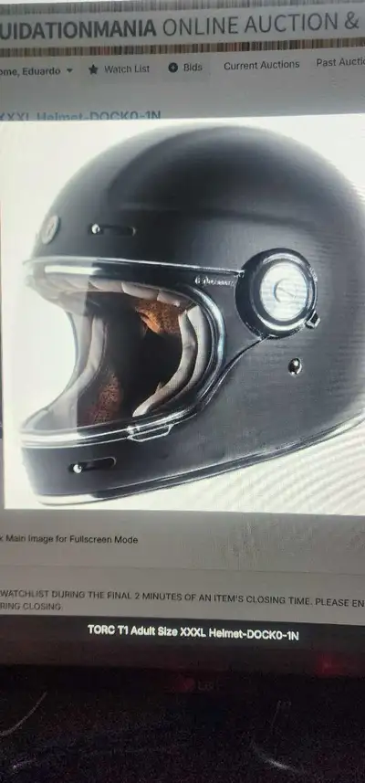 This is a TORC T1 adult helmet, size XXXL, perfect for motorcycle enthusiasts seeking both style and...