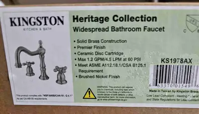This is a brand new, never installed, complete Kingston Heirloom bathroom faucet set. Part number: K...