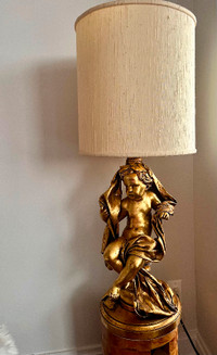 A Very Large Gilt Table Lamp In The Form Of A Cherub Or Putti wi