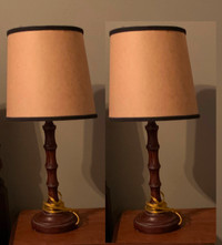Two small lamps with pale yellow shades