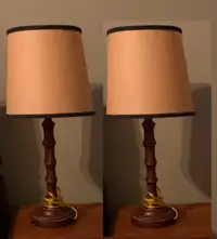 Two small lamps with pale yellow shades