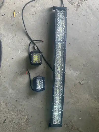 32” curved led light bar still in box comes with 2- 4” led light bars. Never used.