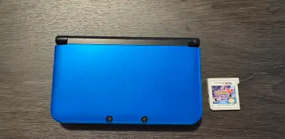 Nintendo 3Ds XL with charger and Pokemon Y. Both works perfectly!