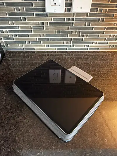 Like new, just reaching for my MacBook or desktop lately. Logitech FolioTouch case comes with it. (M...