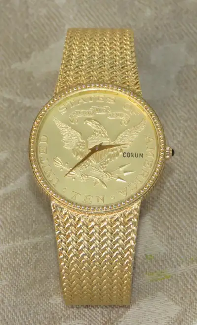 For sale beautiful perfect running CORUM men's watch. High purity gold plated case, stainless steel...