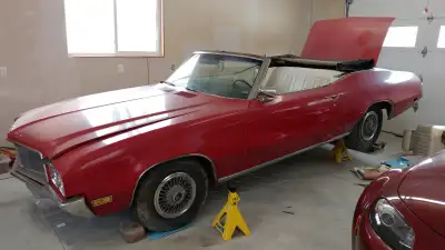 350, 2 brl, bucket seats, console shift, auto, convertible, power steering power drum brakes, Good w...