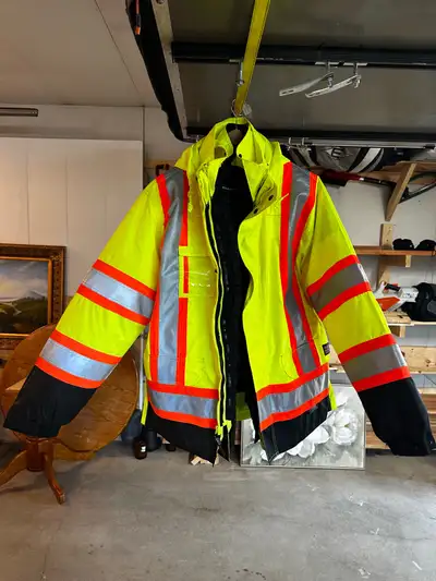 Tough duck 5 in 1 winter safety jacket $150 Like New Very Lightly used in near new condition. XL siz...