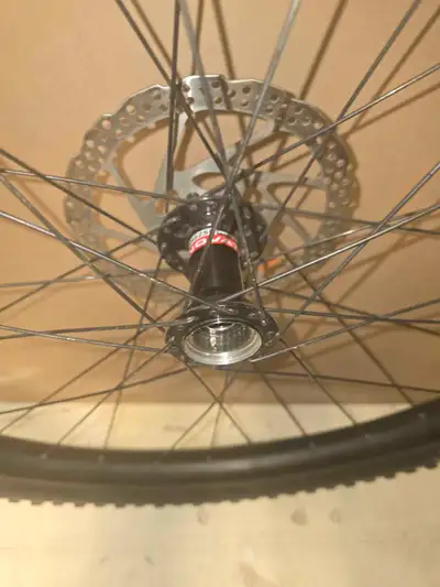 Rear mtn bike wheel with thru axle hub novatech dh82sb minion dhr2 29x2.4 tire
