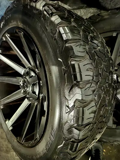 4 BF GOODRICH Baja Champion Alterrain 20 inch Tires and slick steel black rims for sale. $2000 for a...