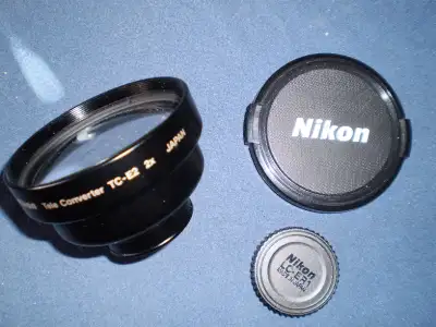 Nikon TC-E2 2X Teleconverter and Minolta 50mm Lens, View more