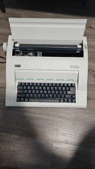 Selling a used Nakajima WPT-150 Electronic Typewriter in good working condition, perfect for writers...
